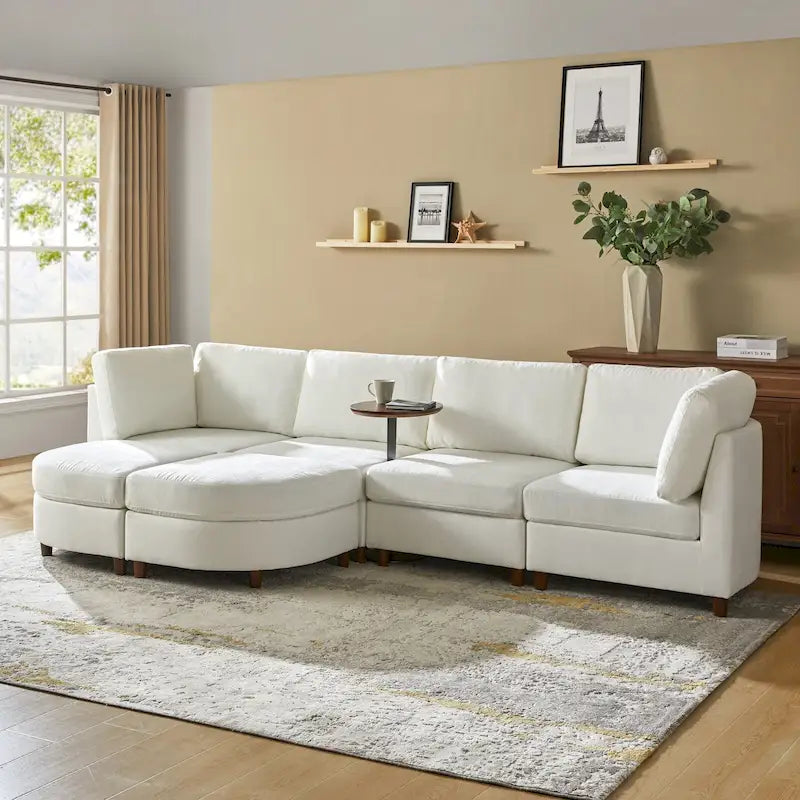 Canapé moderne avec rangement sous l'assise, table ronde et pieds en bois massif