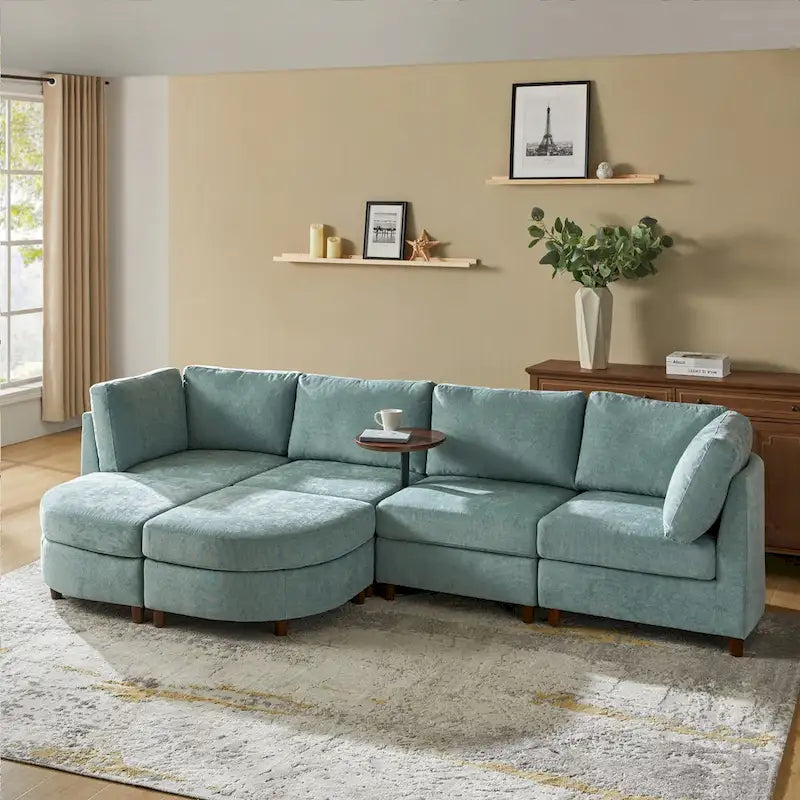 Canapé moderne avec rangement sous l'assise, table ronde et pieds en bois massif